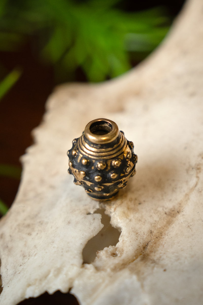 9th-10th century Viking beard bead, bronze