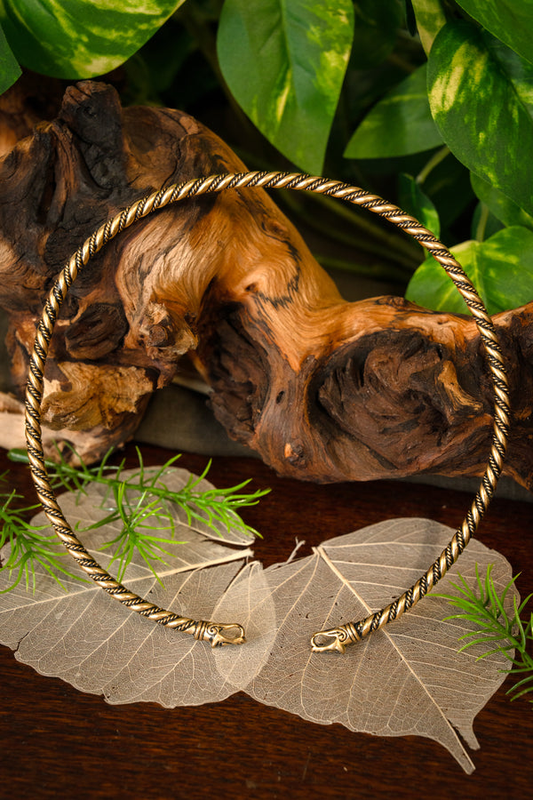 Viking torque with wolf heads, bronze