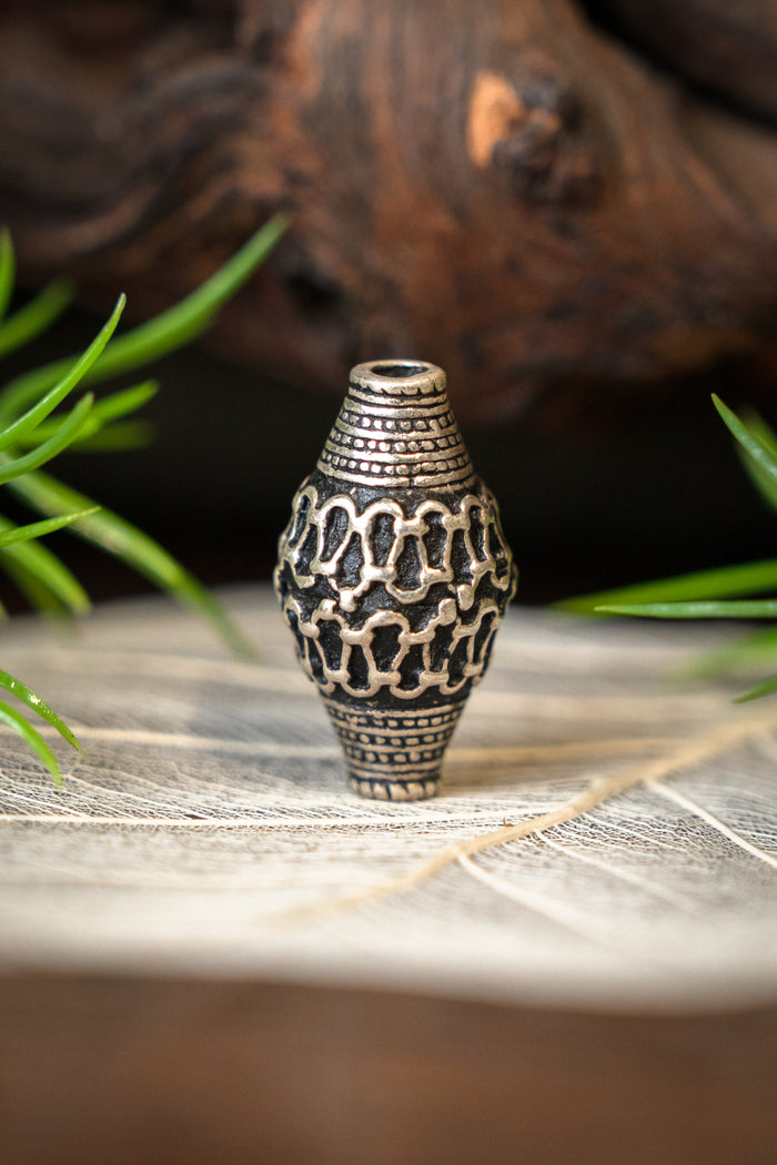 Viking bead Sweden, silvered bronze