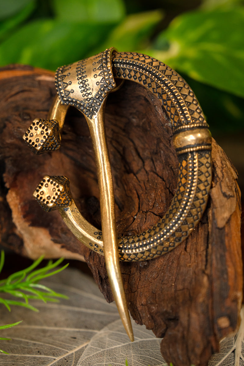 Hoefijzerfibula Klintegarda, brons