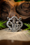 Medieval brooch Madonna, silvered bronze