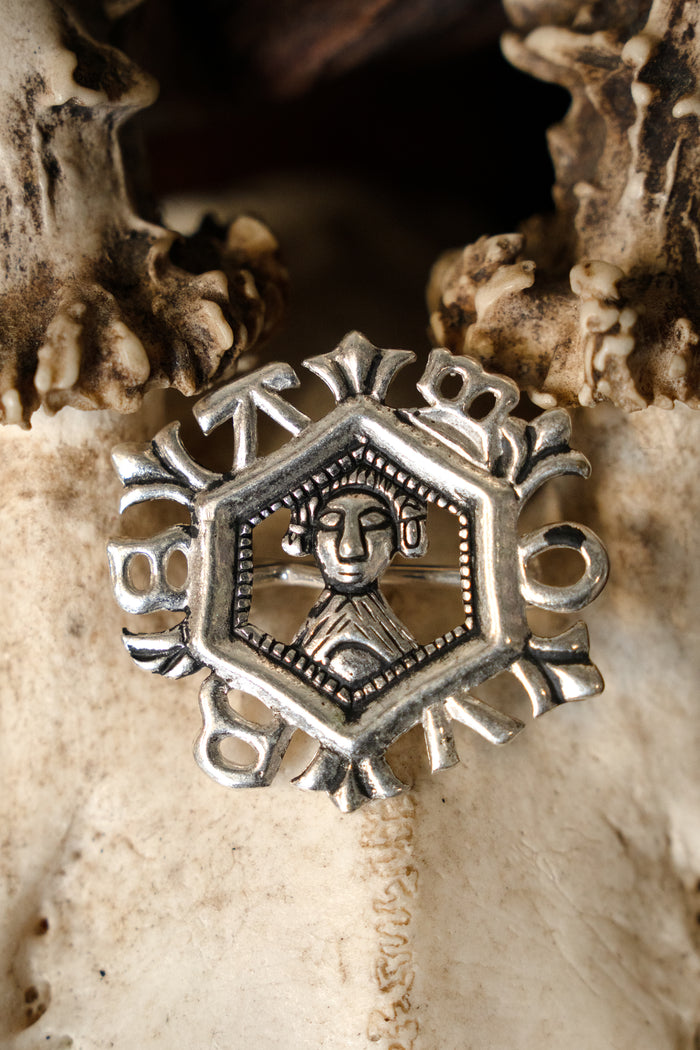 Medieval brooch Amours, silvered bronze