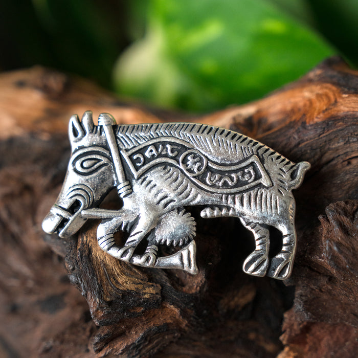 Pilgrim badge pig with bagpipes, silvered bronze