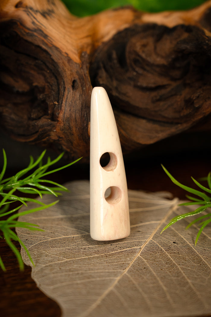 Bone button
