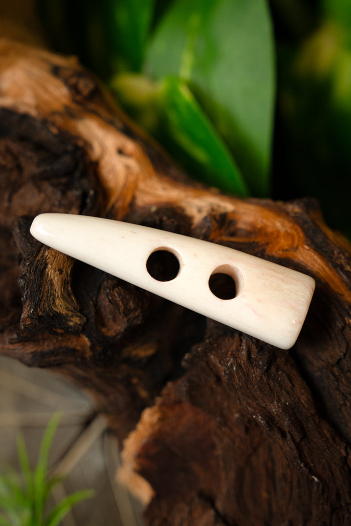 Bone button