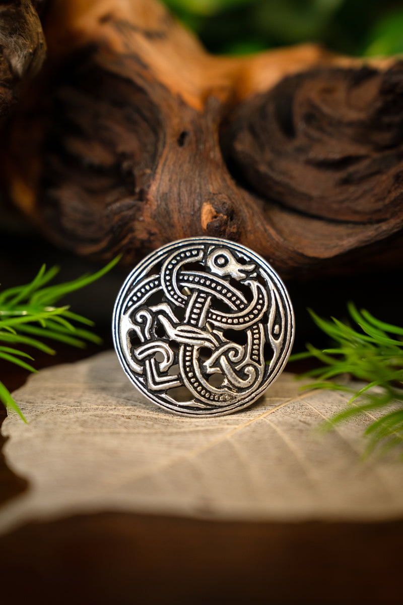 Viking disc fibula Jellinge style, silvered bronze
