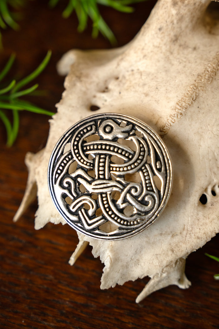 Viking disc fibula Jellinge style, silvered bronze