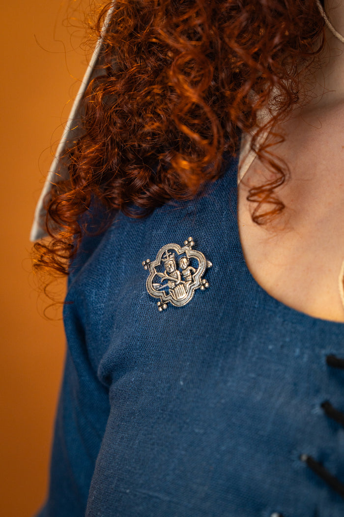 Medieval brooch Madonna, silvered bronze