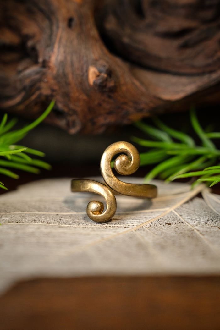 Celtic ring with stylised spiral motif, bronze