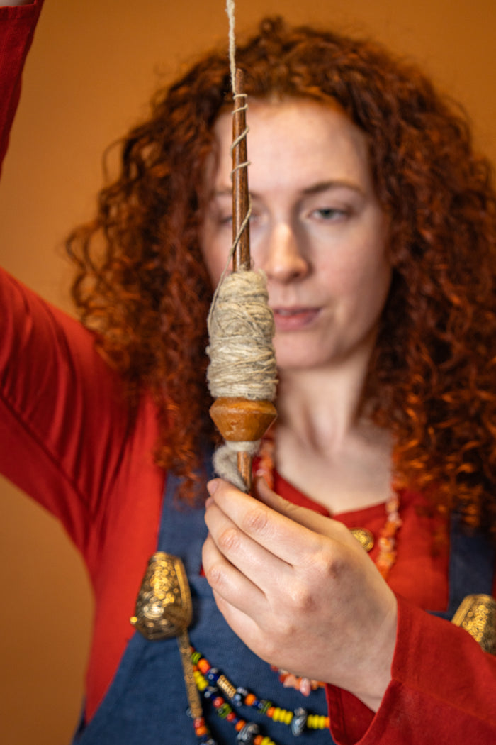 Medieval spinning whorl of clay