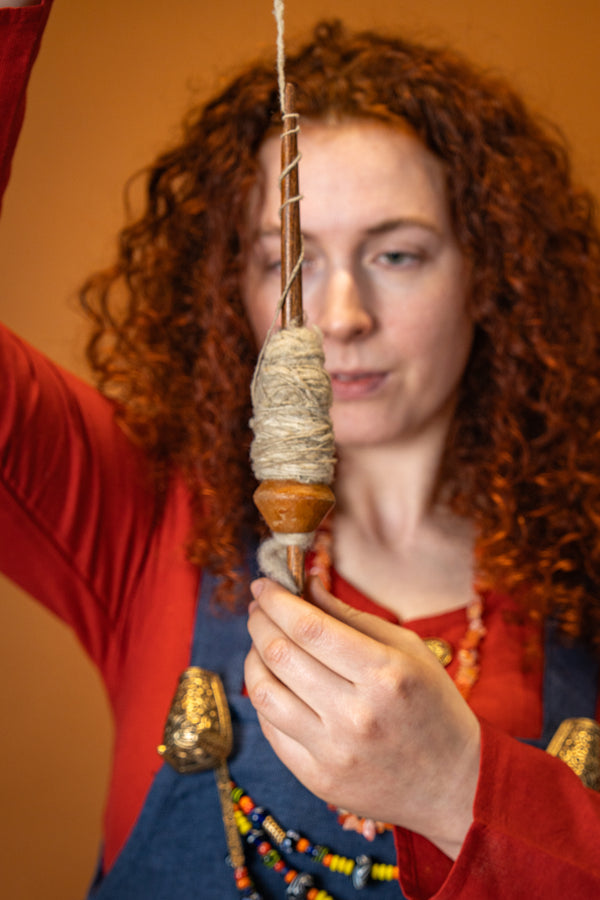 Medieval spinning whorl of clay