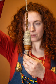 Medieval spinning whorl of clay
