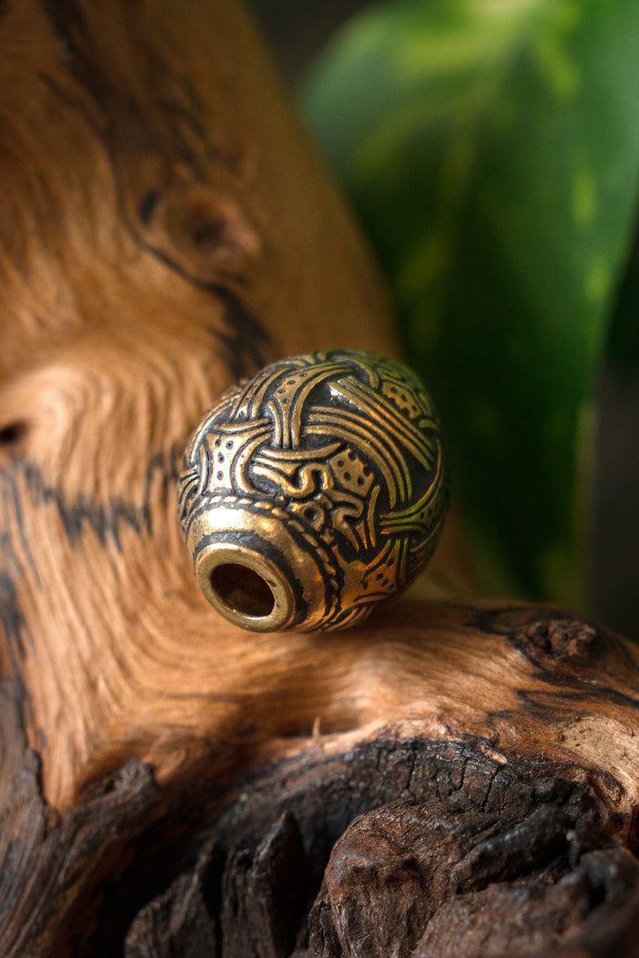 Viking bead Jellinge, bronze
