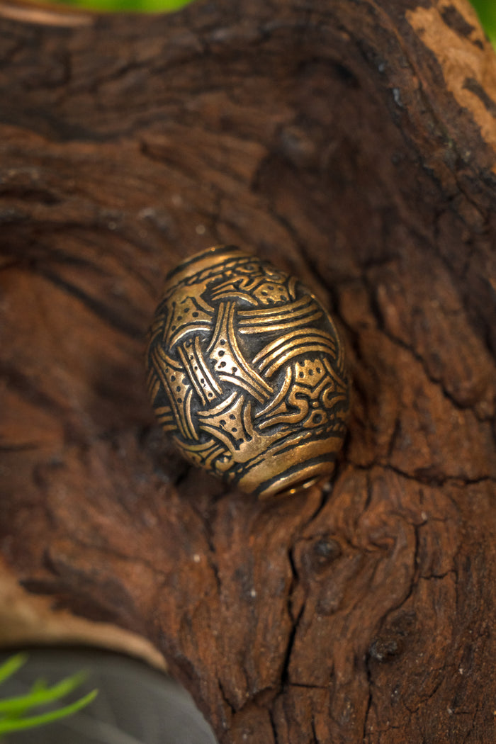Viking bead Jellinge, bronze