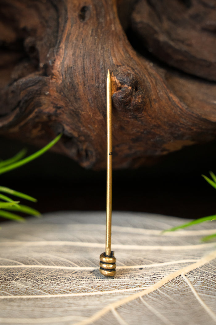 Medieval pin for headwear, brass