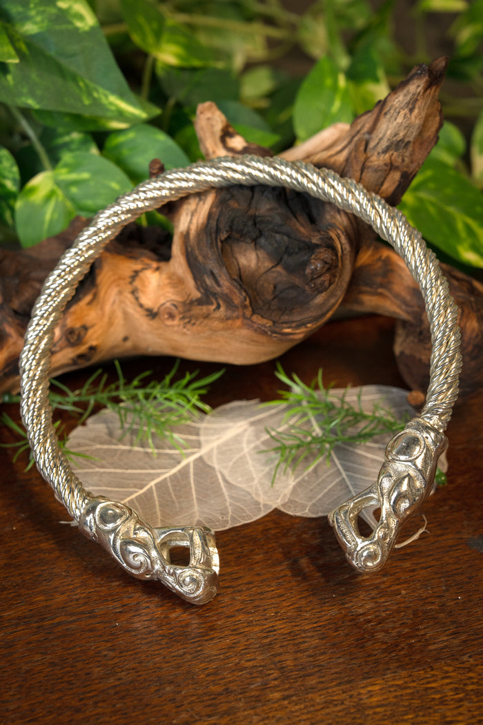 Viking torque with dragons, silvered