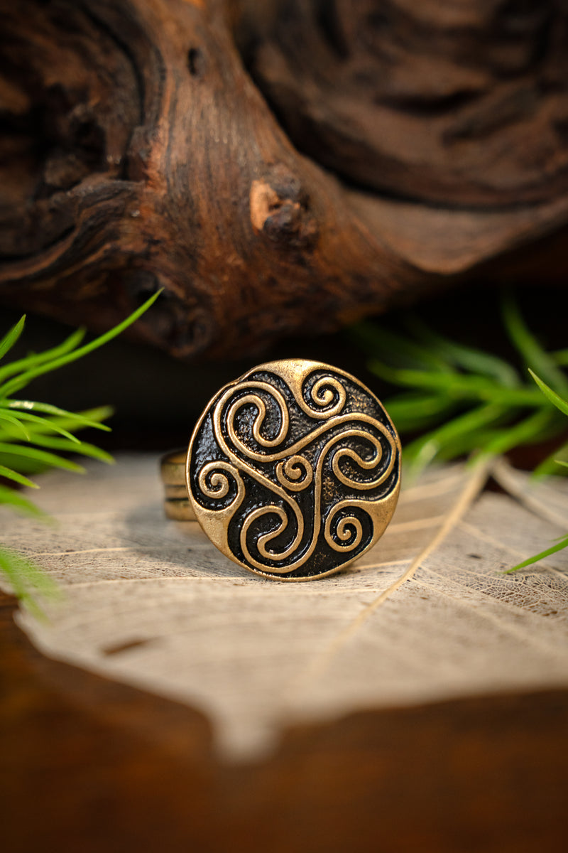 Celtic ring with triskelion, bronze