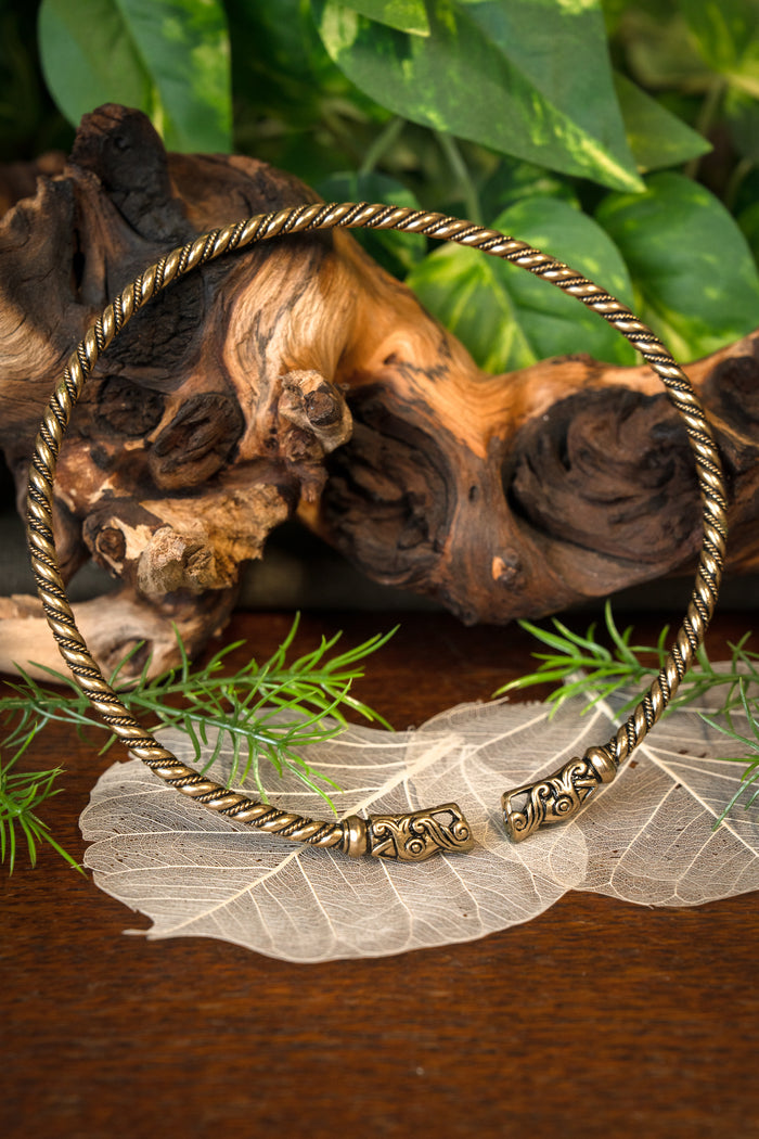 Viking torque with dragon heads, bronze