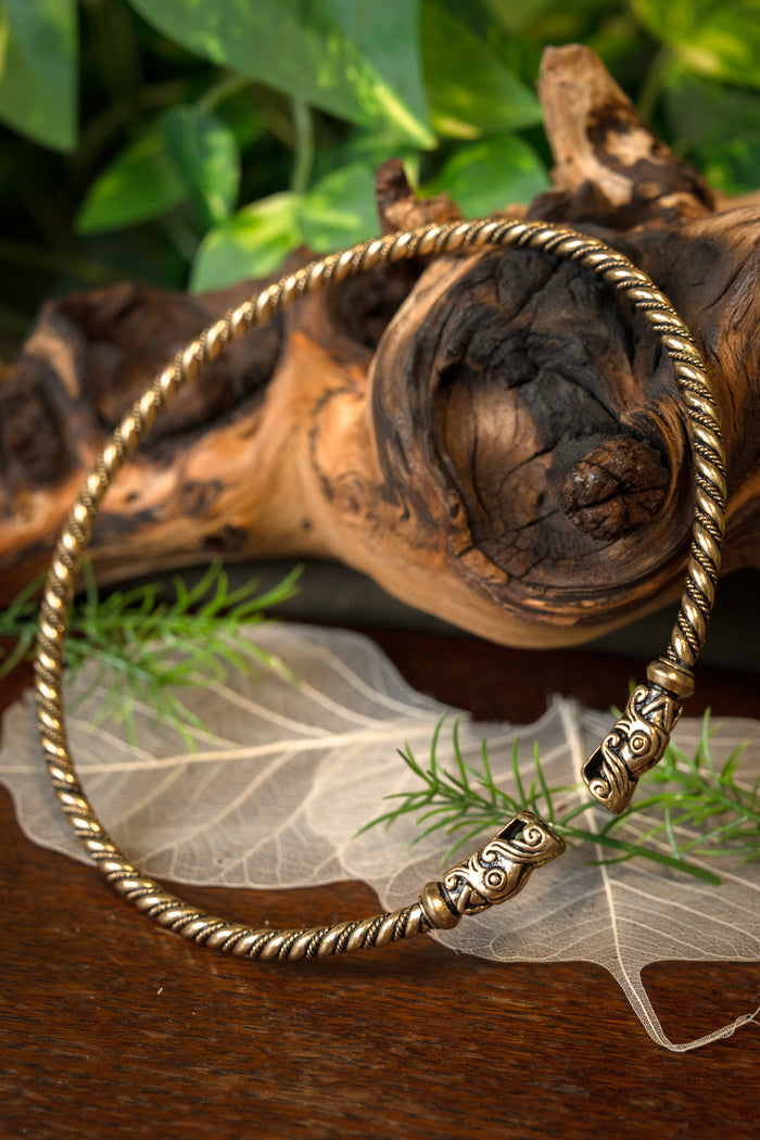 Viking torque with dragon heads, bronze