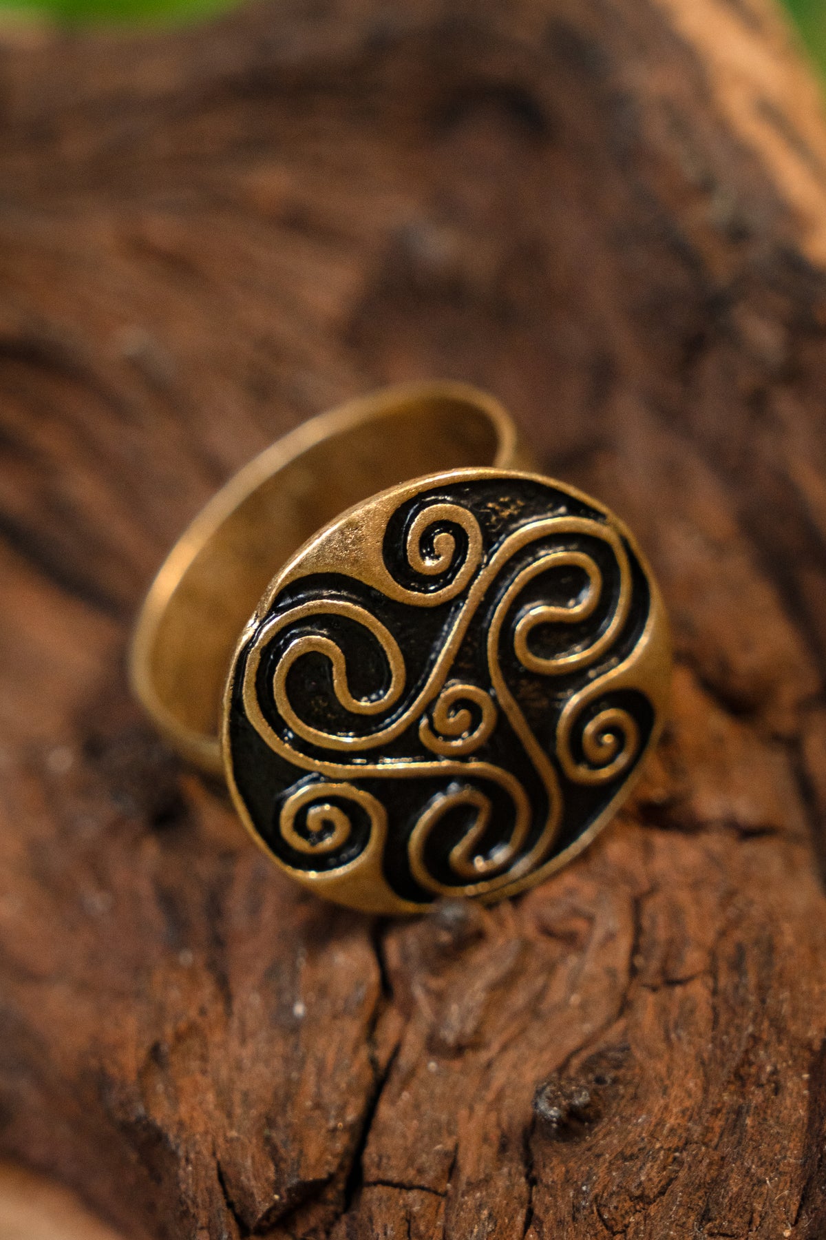 Celtic ring with triskelion, bronze