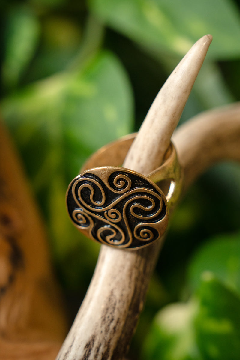 Celtic ring with triskelion, bronze