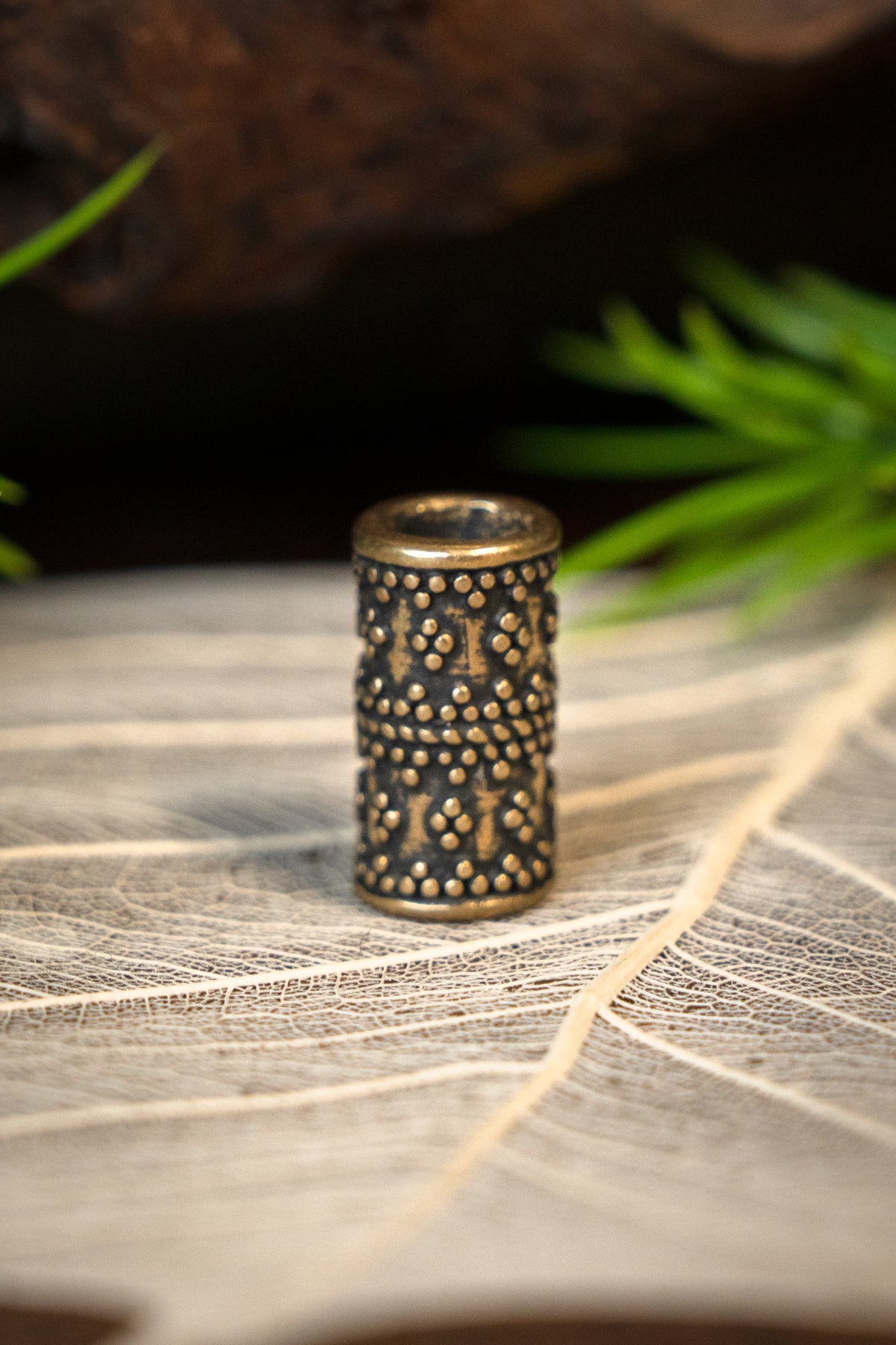 Cylindrical granulated Viking beard bead, bronze