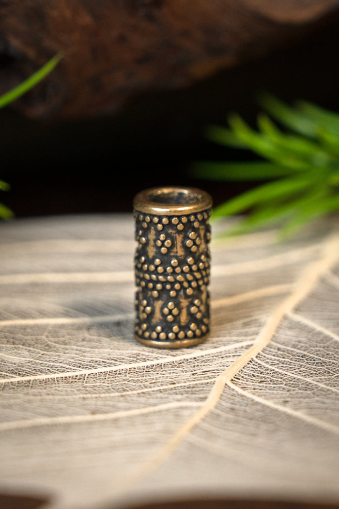 Cylindrical granulated Viking beard bead, bronze