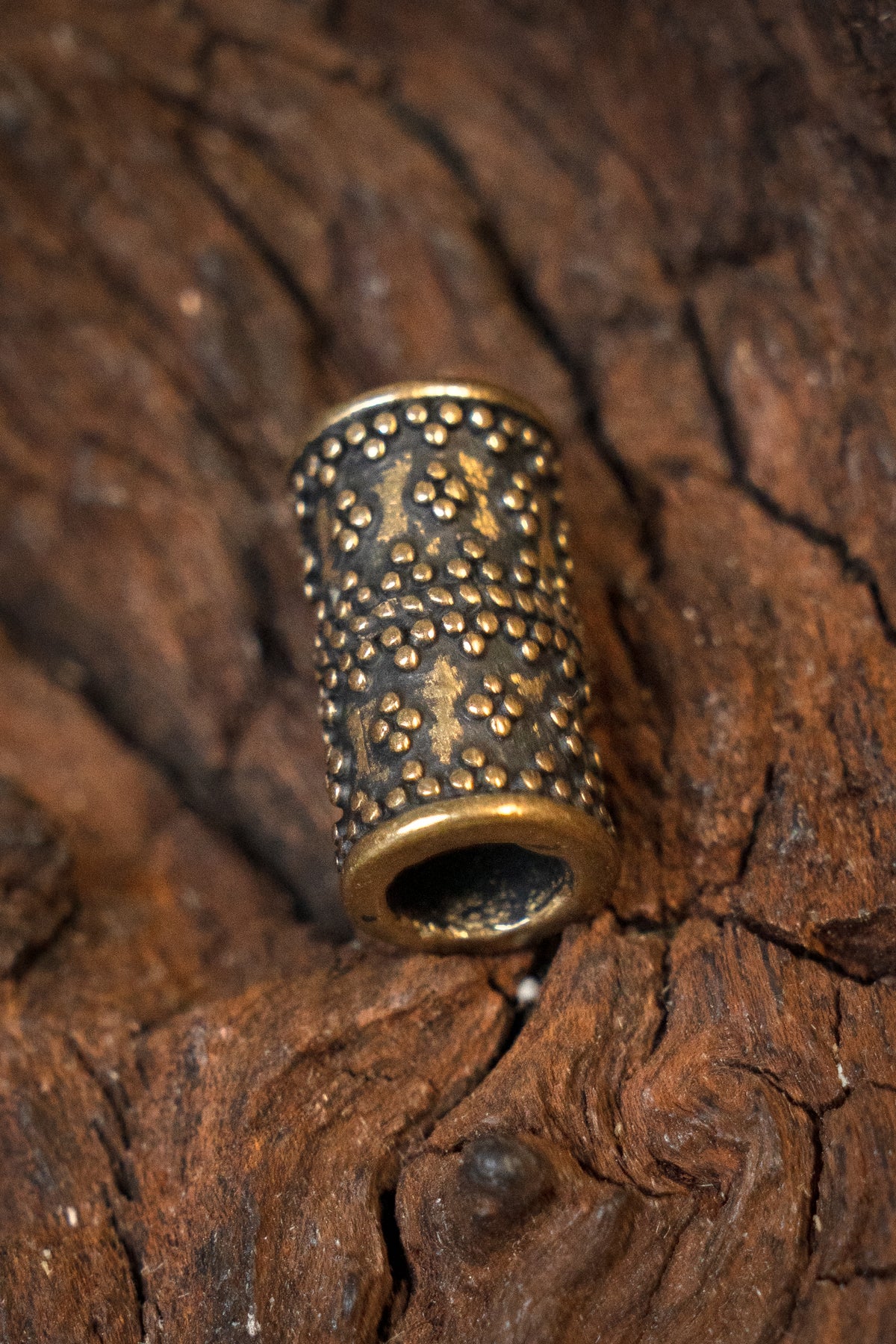 Cylindrical granulated Viking beard bead, bronze