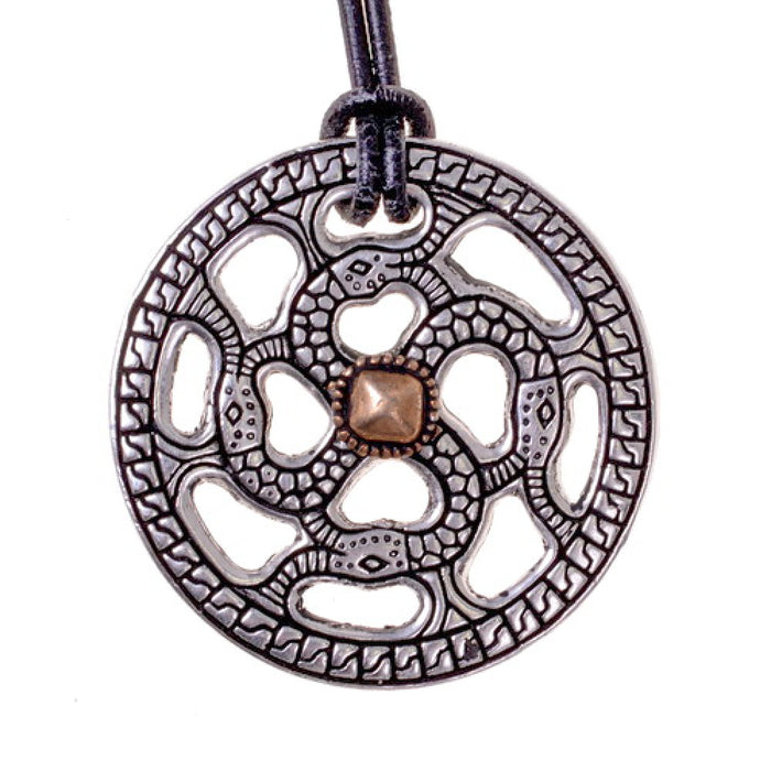 Alemannic decorative disc with snake motif, silvered bronze