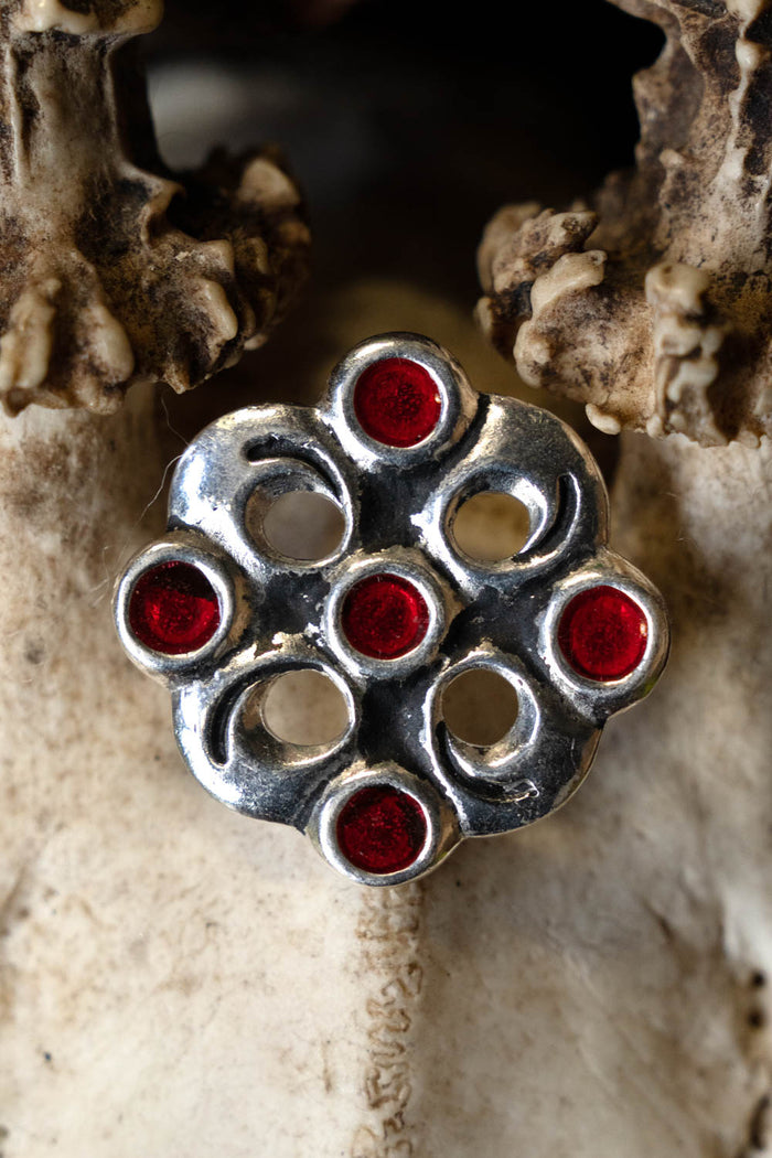 Merovingian cloisonne brooch, silvered bronze