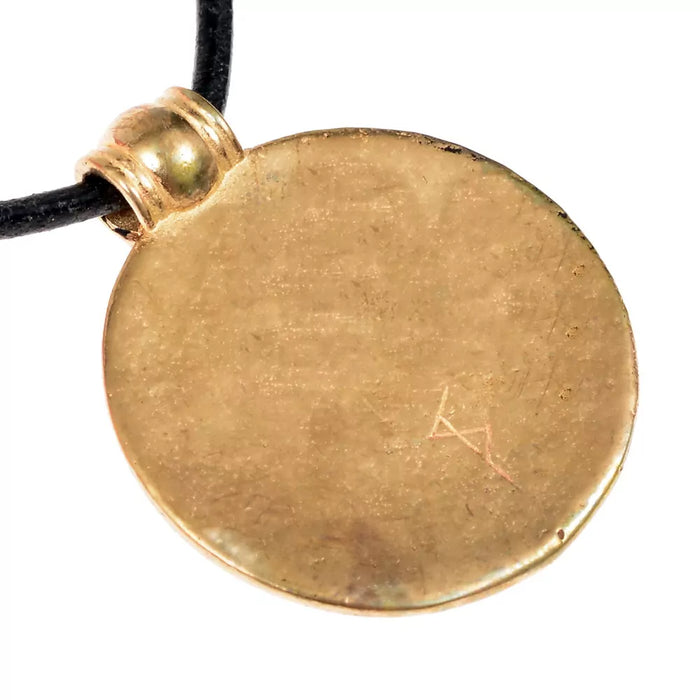 Vendel bracteate amulet Tjurko, bronze