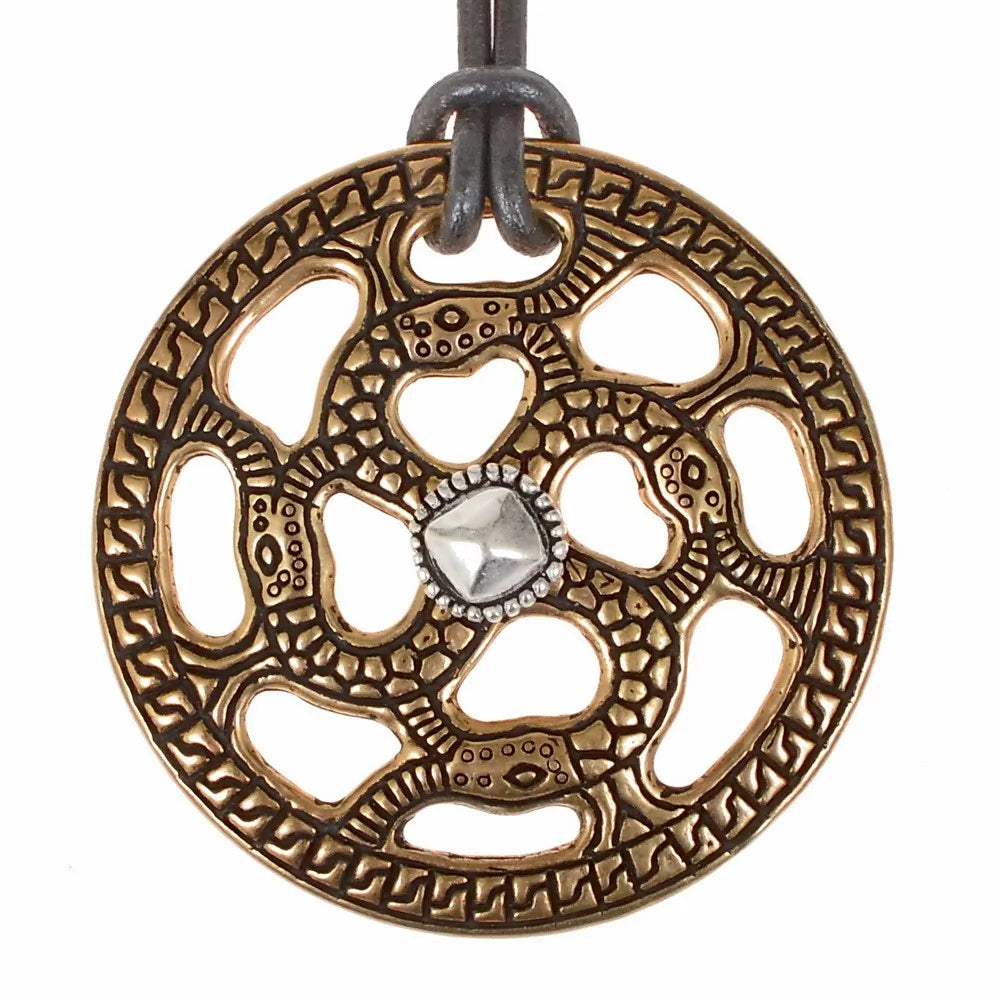 Merovingian decorative disc sun cross, bronze