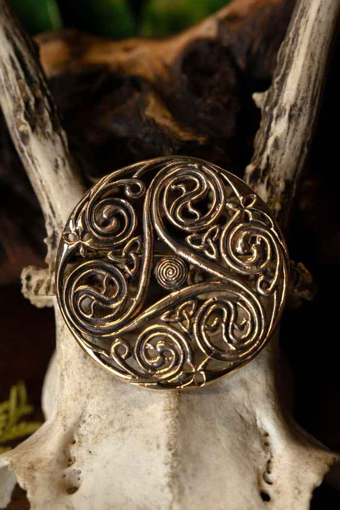 Celtic brooch triskelion, bronze