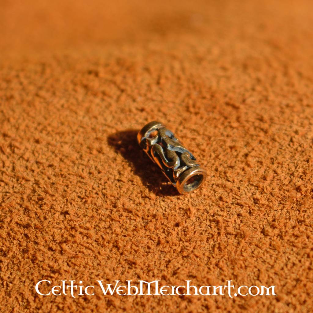 Elongated beard bead with spiral motifs, bronze