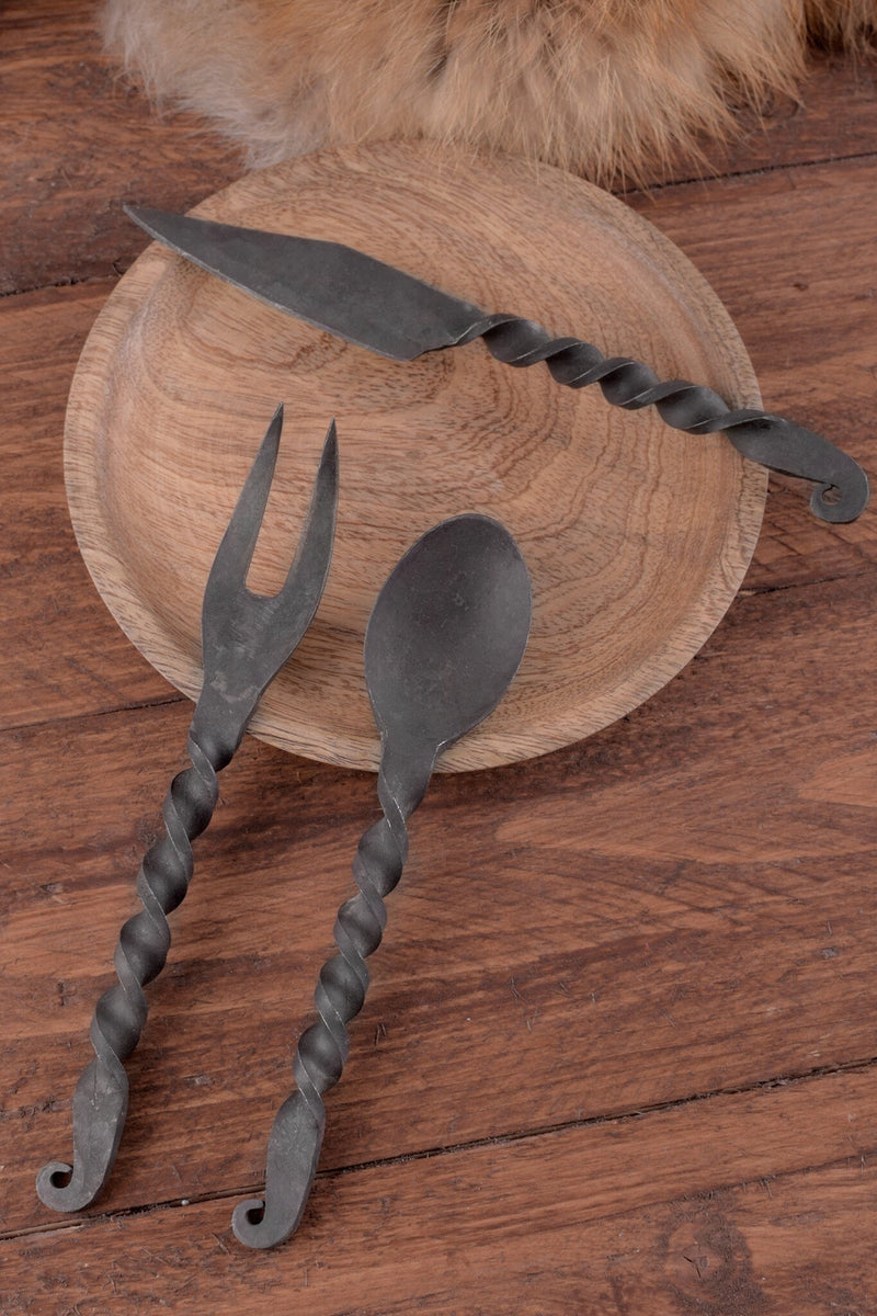 Knife, fork and spoon