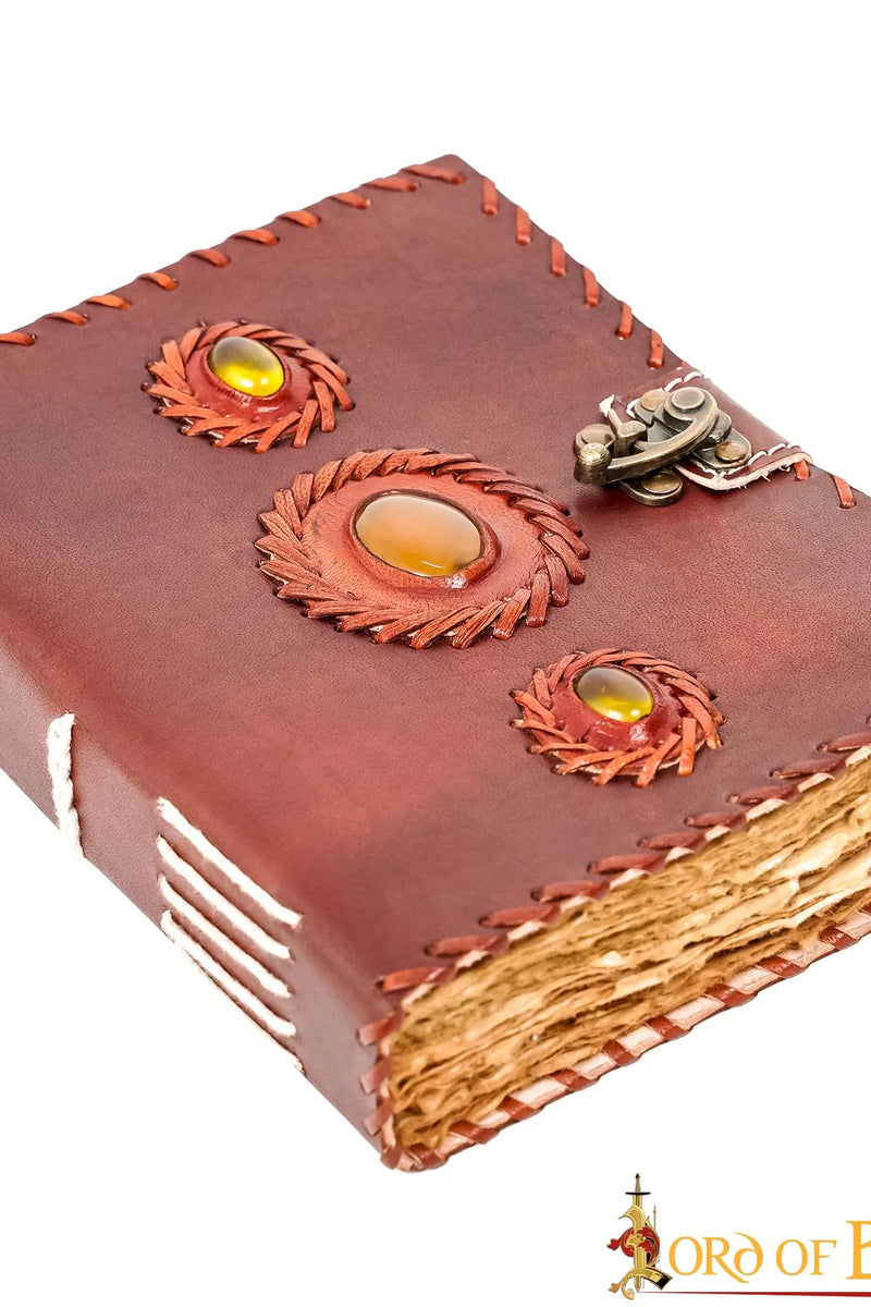 Läderdagbok med stenar