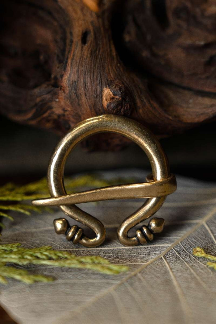 Small Roman Omega brooch, bronze