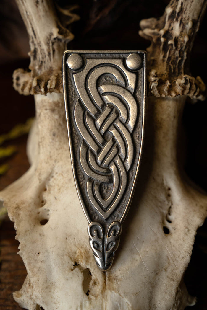 Viking belt end Borre animal, silvered