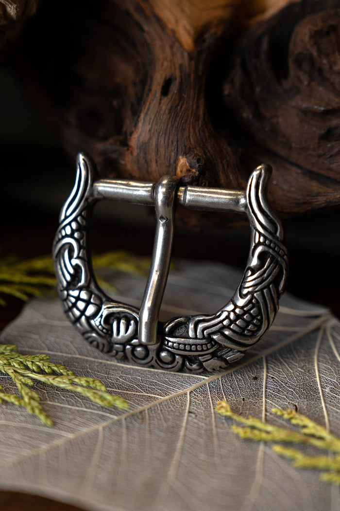 Borre-Jellinge style buckle gripping-beast, silvered