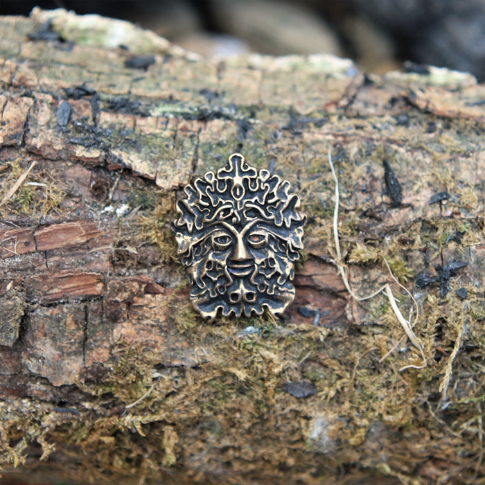 The Green Man amulet, brass