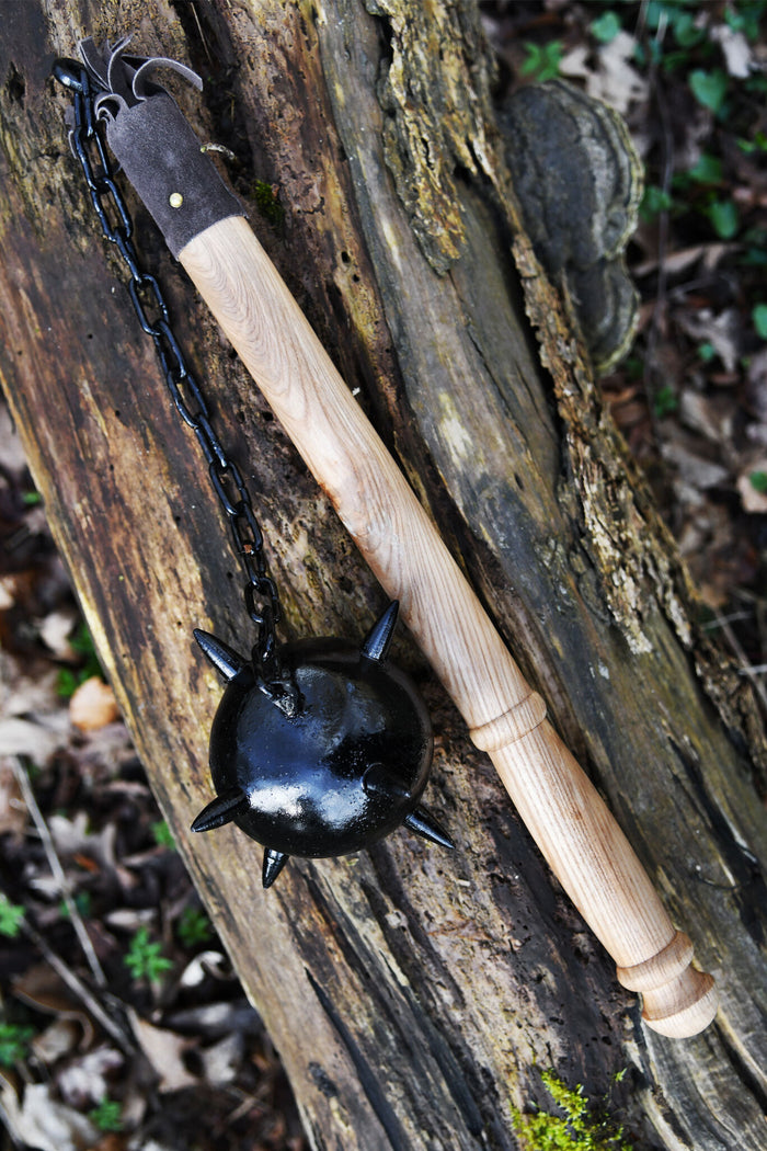 Flail with wooden ball