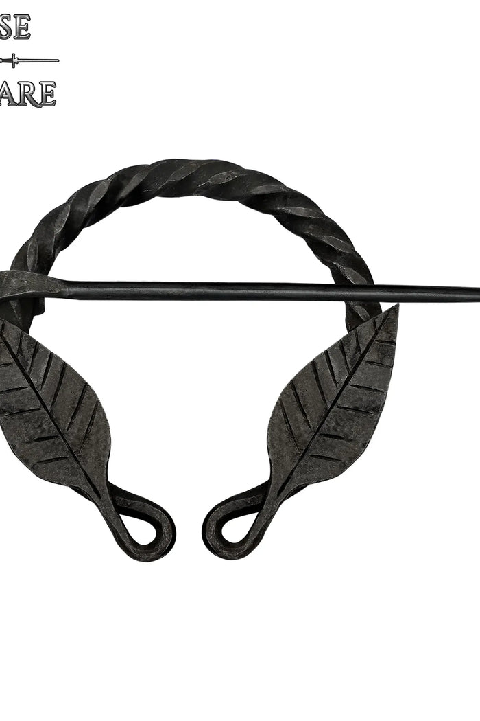 Twisted horseshoe fibula with leaf motif, iron