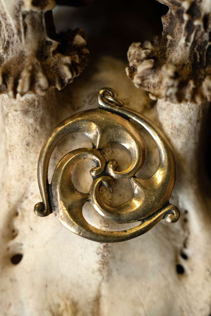 Gallo-Roman solar amulet, bronze