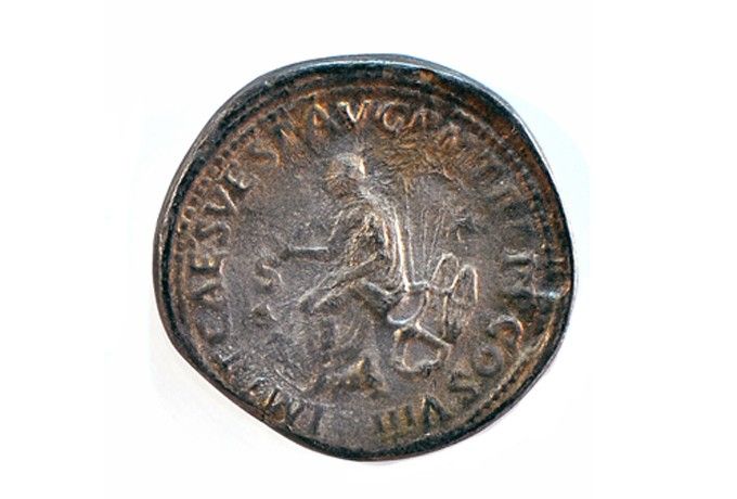 Roman coin opening Colosseum