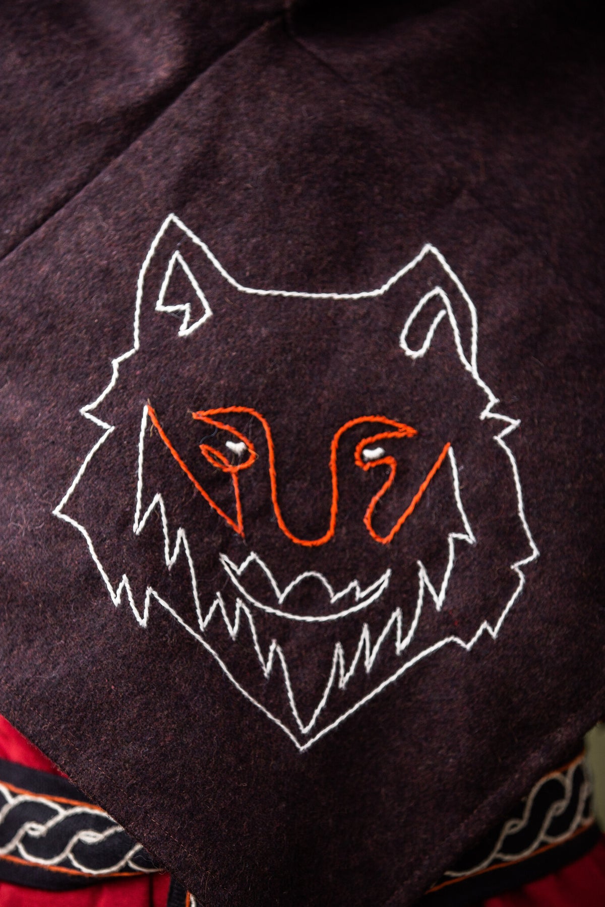 Skjoldehamm hood Halfdan with wolf, brown, wool mix