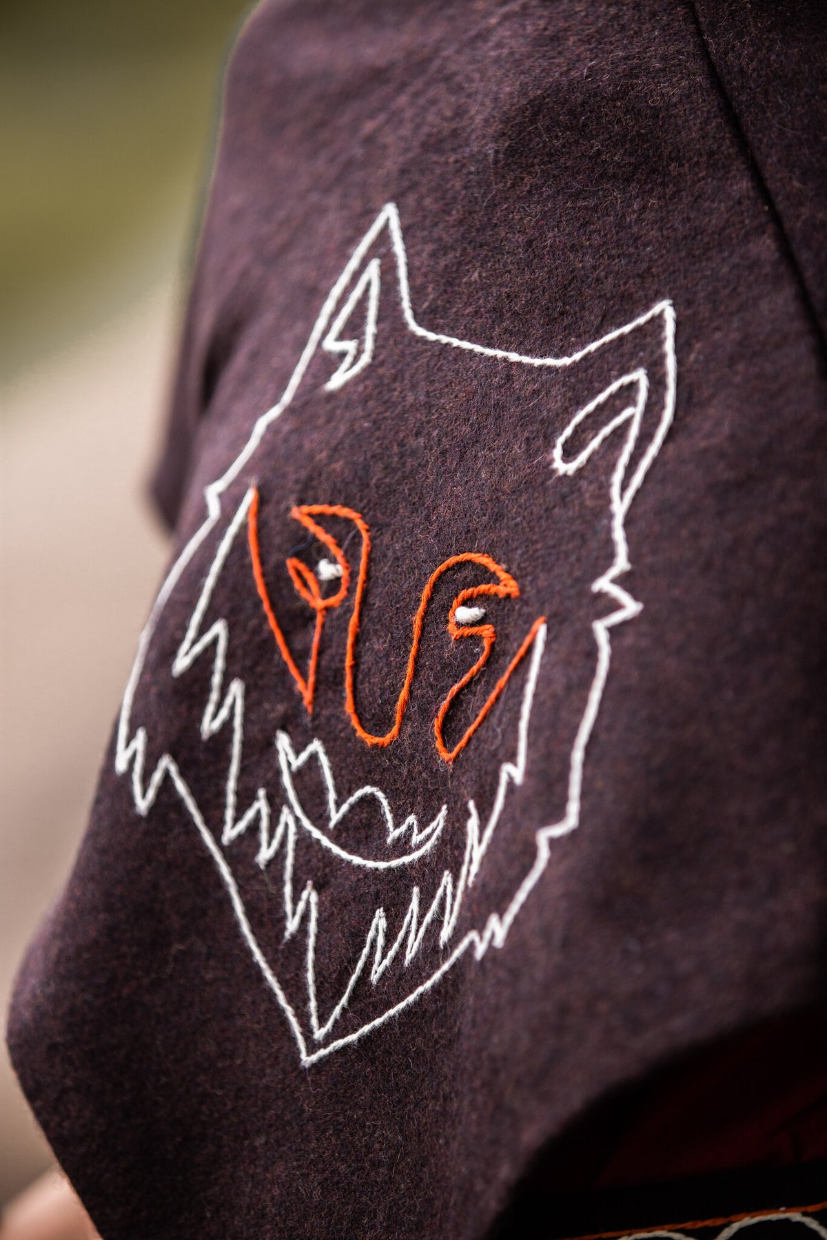 Skjoldehamm hood Halfdan with wolf, brown, wool mix