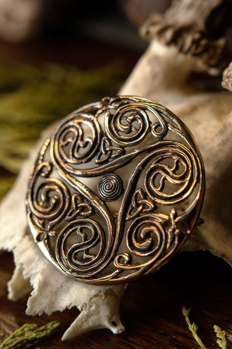 Celtic brooch triskelion, bronze