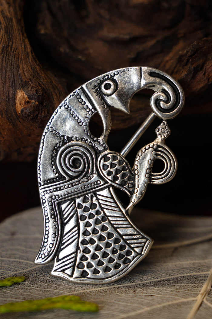 Vendel raven brooch Gotland, right-facing, silvered bronze