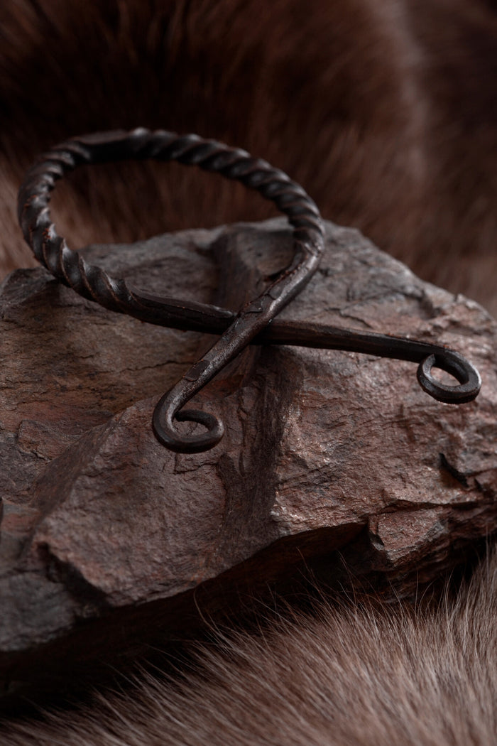 Twisted troll cross, iron