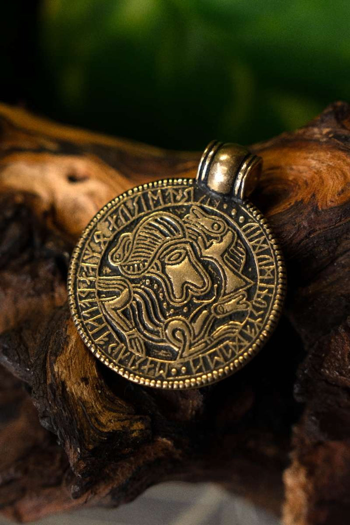 Vendel bracteate amulet Tjurko, bronze